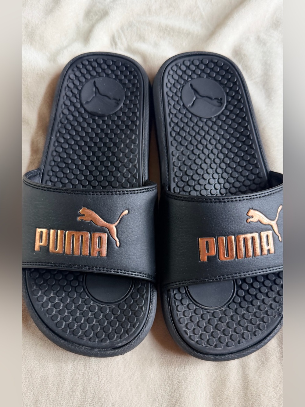 Puma Black Slide Sandals with Copper Logo